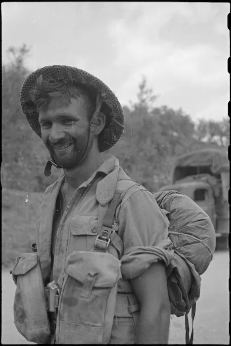 L B Quinn waits for transport to rear after assault on Mt Lignano, Italy, World War II - Photograph taken by George Kaye