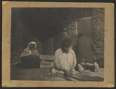 [A woman weaving flax]