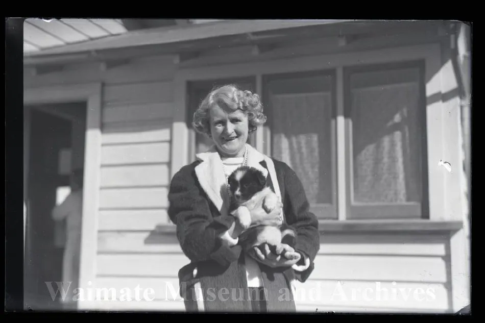 Woman holding puppy