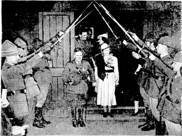 Image: Evening Post" Photo, An archway of swords held by officers .of the Ist Battalion Wellington Regiment (City of Wellington's Own), who provided a guard of honour for Captain and Mrs. A. T. McC. Scott as they left the Cathedral Church of St. Paul after their marriage yesterday afternoon. The bride was formerly Miss Eileen Ano Bennett, daughter of Mr. and Mrs. H. D. Bennett, of Wellington. (Evening Post, 12 September 1939)