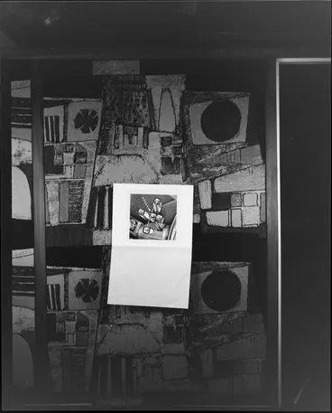 Image: Ford Falcon car advertisement illustration pinned to a 1970s office wall mural