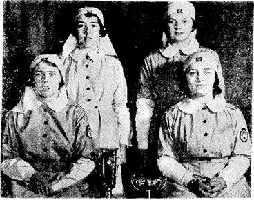 Image: Evening Post" Photo. Winners of the Osbom Cup and R. G. Wilson Trophy at the recent St. John Ambulance Cadet Corps competitions. At back, Cadets I. Pattinson (left) and E. Grieve. Seated Cadets, T. Edwards, leader, and B. Rogers. (Evening Post, 20 September 1939)
