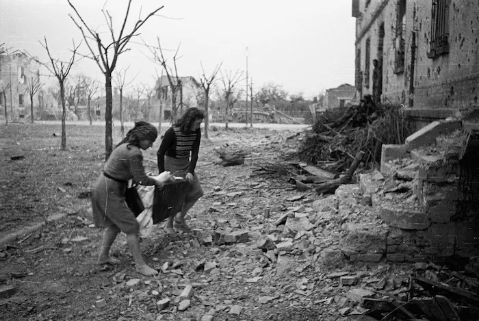 Women of the village of Sesto Imolese, Italy, searching amongst rubble for personal belongings - Photograph taken by George Kaye