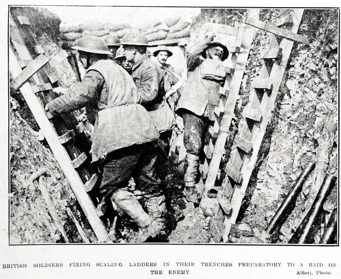 British soldiers fixing scaling ladders in their trenches preparatory to a raid on the enemy