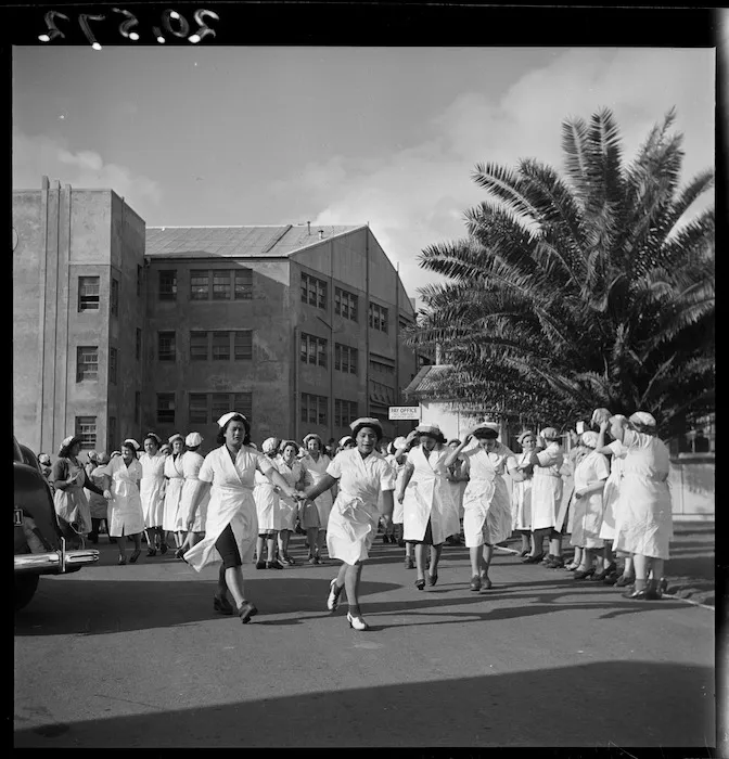 Female freezing works employees outside the works in Otahuhu, Auckland