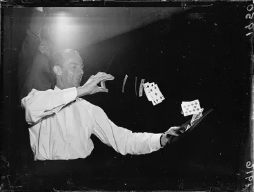 Image: Cecil Morris doing magic card tricks