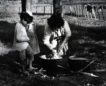 Image: Mutu and Rebecca watch Mother. From the series: Washday at the pa