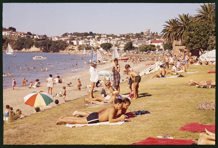 St Heliers Beach, Auckland, two men in foreground