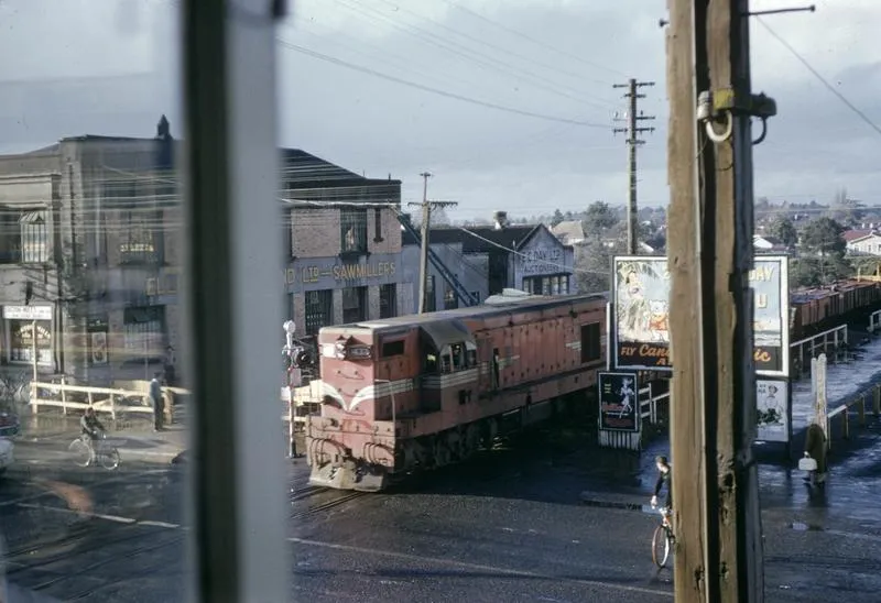 A NZR diesel locomotive crosses Victoria Street