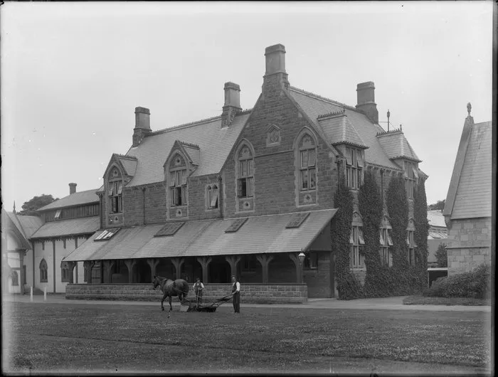 Groundsmen with a horse-drawn lawnmower at south end of quadrangle, Christ's College, Christchurch
