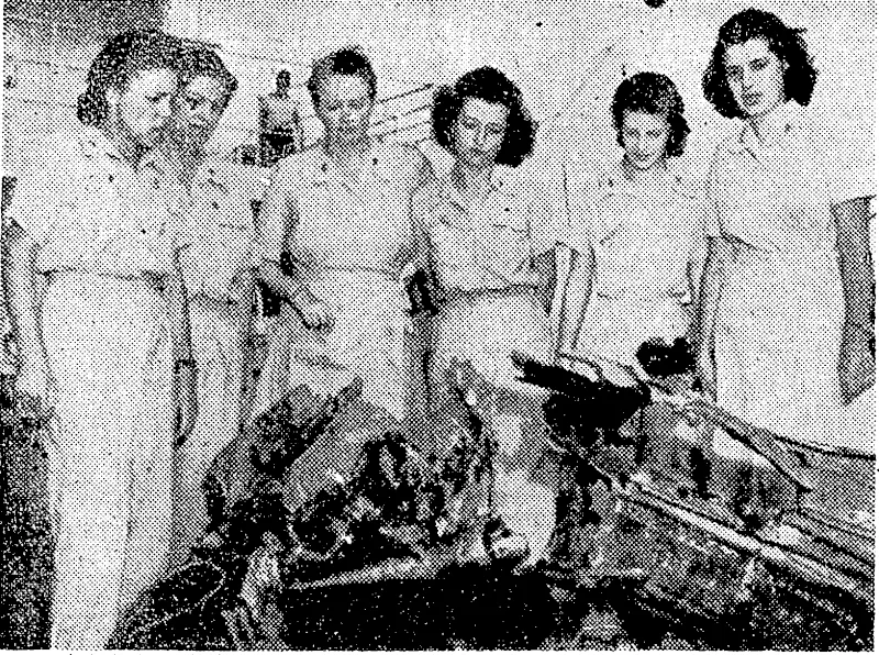 American army nurses who survived the suicide attack of a Japanese plane on the American hospital ship Comfort inspect the wreckage of the aircraft. The hospital ship, which was evacuating wounded from Okinawa, suffered 29. killed and 33 seriously wounded and missing, including patients, medical personnel, and crew. At the time of the attack the ship was operating under full hospital-ship procedure, and was clearly marked and fully lighted. (Evening Post, 04 June 1945)