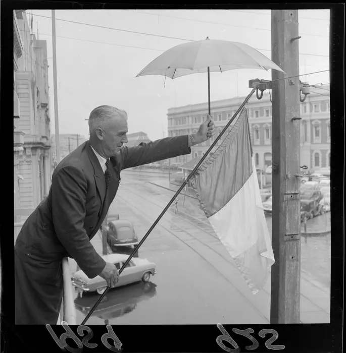 Mr J F Aspell flying the Irish flag on St Patrick's Day