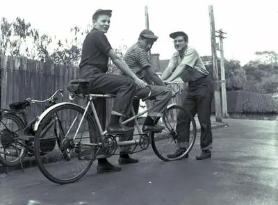 Blind boy [on] tandem.