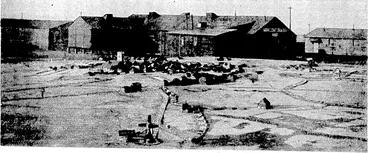 Image: WAR MEMORIES.—/* view of the huts at CannocJc Chase. Staffordshire, England, used by members of the New Zealand Rifle Brigade during the Great War. In the foreground is the famous concrete model of the Messincs sector of the Western Front. (Evening Post, 15 July 1936)