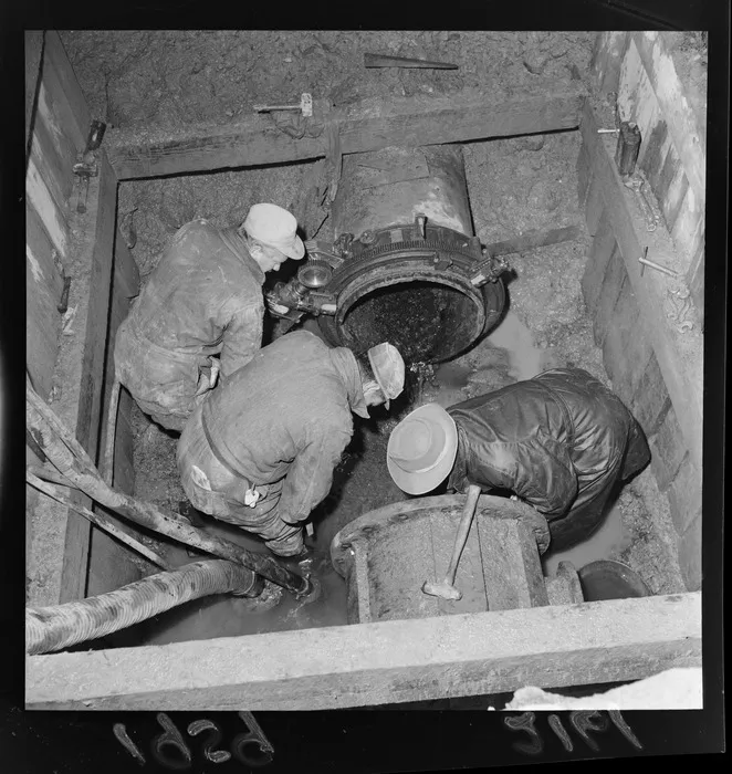 Maintenance work on Wainuiomata water main, Lower Hutt, Wellington Region, including unidentified workers