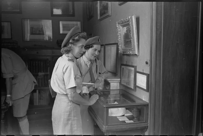 Off duty Tuis examining John Keats mementos in the Keats House in Rome, Italy, World War II - Photograph taken by George Kaye