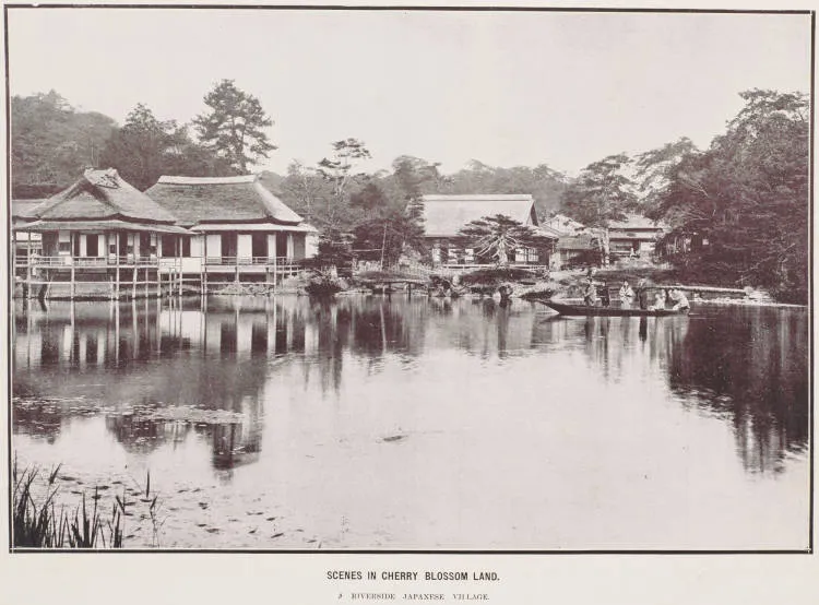 Scenes in cherry blossom land. A river side Japanese village
