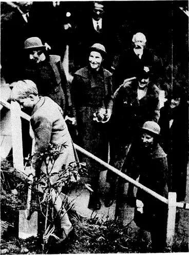 Image: Erenlng Post" Photo. The Hon. Simon Moncklon-Arundell, only son of the Governor-General, Lord Galway, planting a tree in the rhododendron dell in Kelburn, near the cable tram terminus, as part of today's Arbor Day celebrations. Standing outside the rail are the Governor-General's three daughters, the Hon. Celia (left), the Hon. Mary, and the Hon, Isabel Monckton, (Evening Post, 11 August 1937)