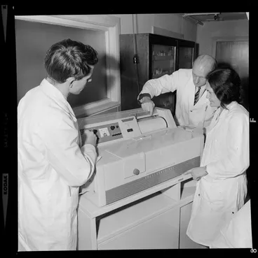 Image: Pharmacy students viewing a demonstration of how the Spectronic 505 machine works, Central Institute of Technology, Petone, Wellington