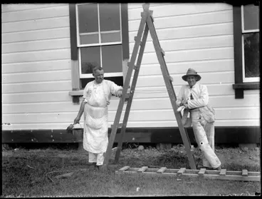 Men Painting House Image: Men Painting House