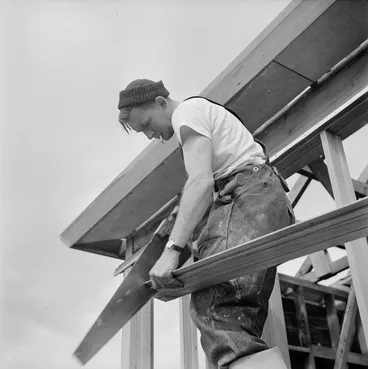 Image: Carpenter building a state house