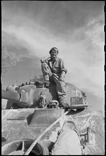 Image: New Zealand tankie has good view of country as his tank advances towards Florence, Italy, World War II - Photograph taken by George Kaye