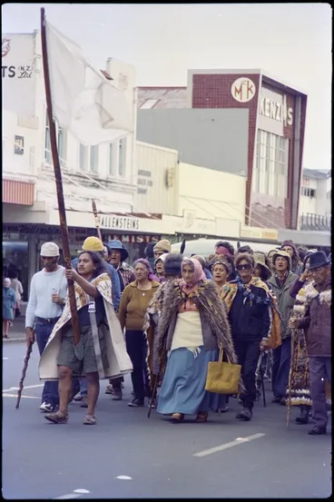 Image: Tame Iti holding pou whenua, accompanied by Whina Cooper, leading Māori Land March along Hamilton street