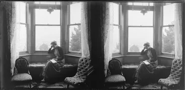 Image: Lydia Williams reading at the window of their house, Dunedin