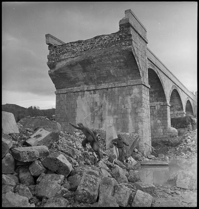 Close up of wreckage of bridge demolished by Germans in Italy, World War II - Photograph taken by George Kaye
