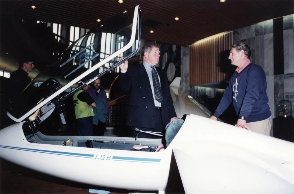 Gliding Club, Kaitoke; Mayor Rex Kirton and Tony van Dyk in the hangar.