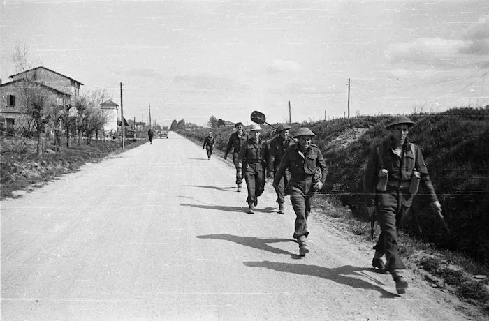 Kaye, George, 1914- : New Zealand Engineers returning from searching for mines, Senio River area, Italy