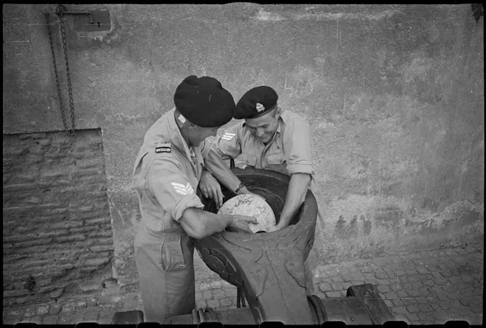 J P Dalton and R T Hamilton examine an ancient catapault at the Castel St Angelo in Rome, Italy World War II - Photograph taken by George Kaye