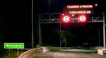Image: Tsunami warning sign on motorway
