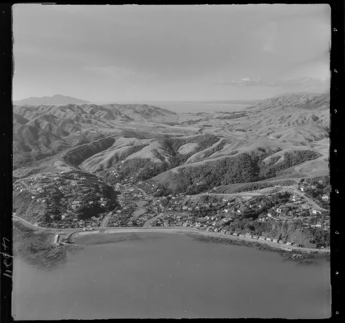 Karehana Bay and Plimmerton Boating Club with Moana Road foreground, looking north to Pukerua Bay and the Kapiti Coast beyond, Wellington Region