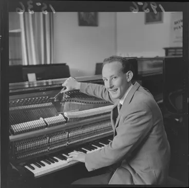 Image: Piano tuner Les Dorizac tuning an upright piano