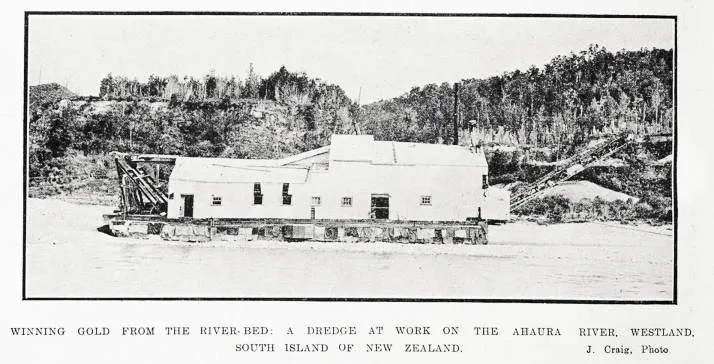 Winning gold from the river-bed: a dredge at work on the Ahaura river, Westland, South Island of New Zealand