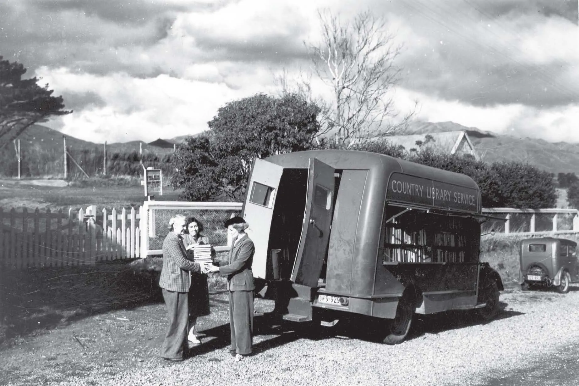 CLS van on the road, 1948. Evelyn Franklin, of the Library School class of 1946, is the field librarian. Alexander Turnbull Library, F-16090-1/4
