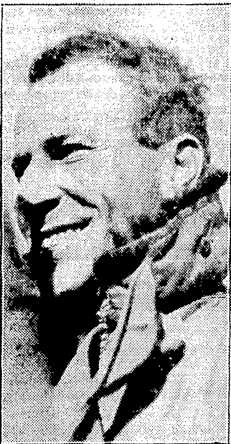 THE SMILE OF VICTORS. Captain Kingsford Smith as seen by the crowd just after he had emerged from the Southern Cross. (Evening Post, 12 September 1928)