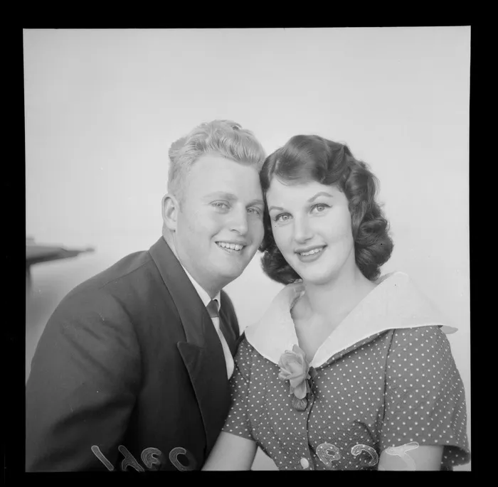 Engagement portrait of Jack Boyd and Maureen Oldham within an unknown building location, probably Wellington Region