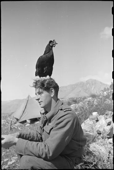 Image: Lulu, the much travelled mascot of 6 Field Advanced Dressing Station, with M Batistich, Italy, World War II - Photograph taken by George Kaye