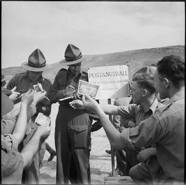 Image: Bookmakers take bets at race meeting organised by 36 New Zealand Survey Battery in Trans Jordania, World War II - Photograph taken by M D Elias