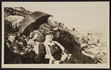 Image: Katherine Mansfield reclining beside rocks