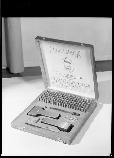 Image: Metal stamps of letters in carry box