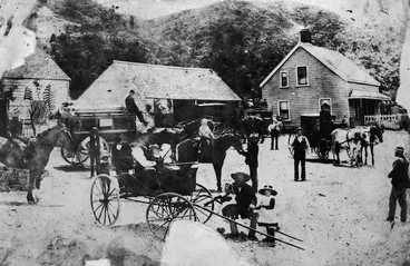 Image: Scene in Parliament Street, Lower Hutt, with coaching stables, carriages and horses