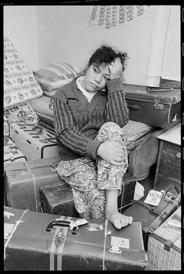 Image: Ana Likio at her home in Waitangirua, surrounded by luggage - Photograph taken by Ray Pigney