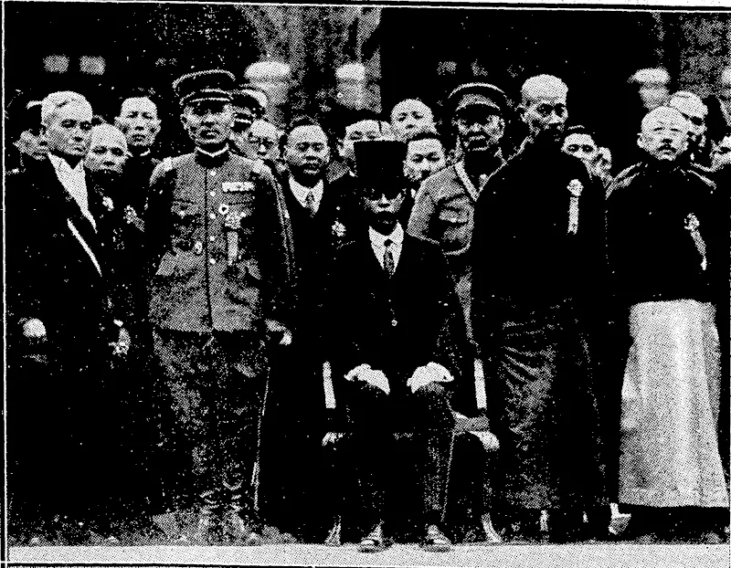 EX-EMPEROR OF CHINA PROCLAIMED HEAD OF THE NEW MANCHURfAN STATE.-Hswn Tung (in top hat), known as Mr. Pu Vi since his abdication as Emperor of China, with Japanese representatives at his proclamation as head of the new Manchurian Stale. Count Uchida and General Honjo, two notable Japanese, are on the left. (Evening Post, 26 May 1932)
