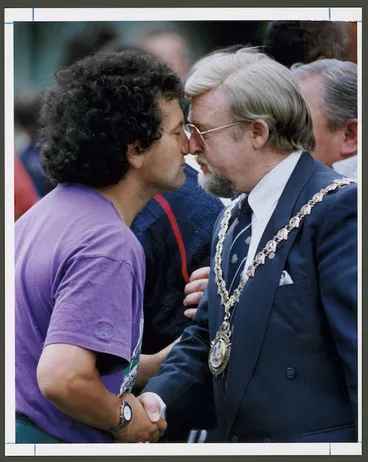 Image: Mayor of Wanganui, Chas Poynter, greeting Ken Mair with a hongi - Photograph taken by Phil Reid