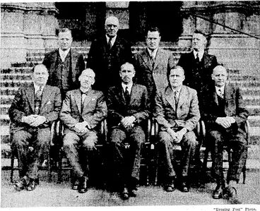 Image: Members of the New Zealand Dental Council, recently set up under the new legislation, assembled in ■Wellington today for the first time. Standing, from left, Mr. 0. V. Davies (Dunedin), Mr. J.T. Cooper (Dunedin), Dr. P. P. Lynch (Wellington), Mr. C. J. Drake, secretary. Seated, Mr. W. P. Somerville (Wellington),- Professor R. B. Dodds (Dunedin), Mr. J. L. Sounders, chairman, Professor C. E. Hercus ■ ■■ (Dunedin), and Mr. J.N: Rishworth (Auckland). (Evening Post, 18 September 1937)