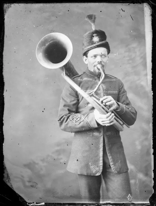 Military band member with helicon