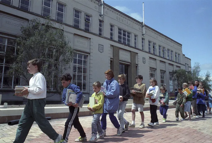 Pupils from the Children's Learning Group alternative school, shifting books from the old Wellington Public Library to the new one - Photograph taken by John Nicholson